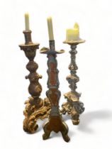 Three Renaissance style candlesticks