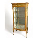 A fine late 19th century French kingwood and gilt bronze mounted display cabinet / vitrine