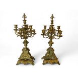 A pair of late 19th century Louis XIV style gilt metal six light candelabra