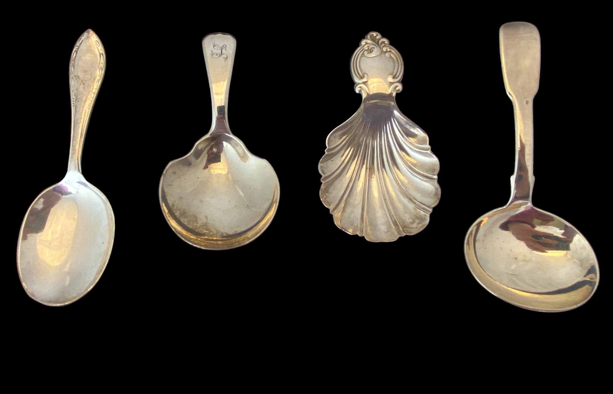 A group of four silver caddy spoons