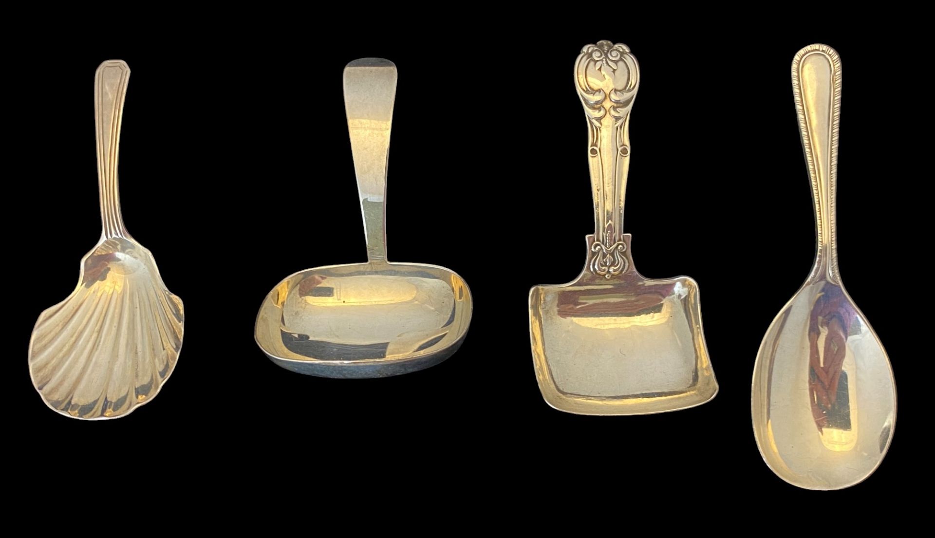 A group of four silver caddy spoons