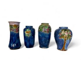 Four various Royal Doulton tube-lined vases