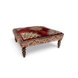 A large 19th century style flock tapestry covered footstool