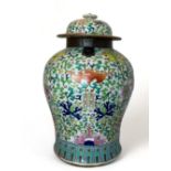 An 18th century Chinese famille verte vase and cover