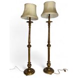 A pair of early 20th century Italian giltwood standard lamps