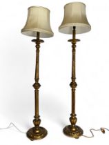 A pair of early 20th century Italian giltwood standard lamps