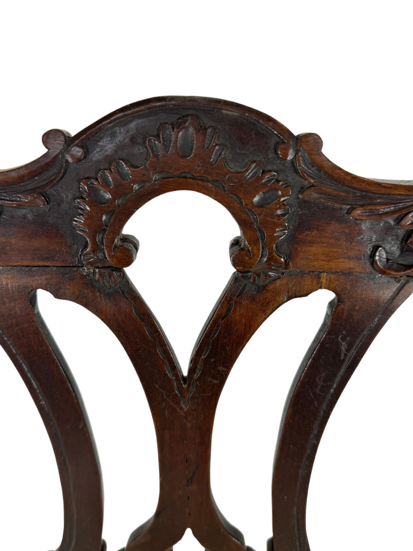 A set of four George III provincial carved mahogany dining chairs in the Chippendale style - Image 3 of 7
