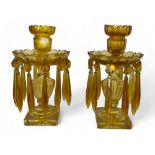 A pair of 19th century amber cut glass table lustres