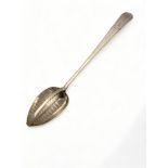 A fine George III century Irish silver divided straining spoon, James Bradie, Dublin, 1797