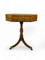 A small Regency mahogany and ebony marquetry octagonal centre table