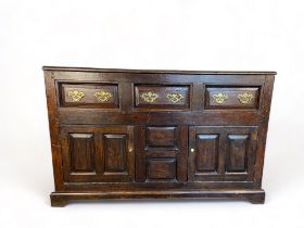 A late 17th century oak dresser base