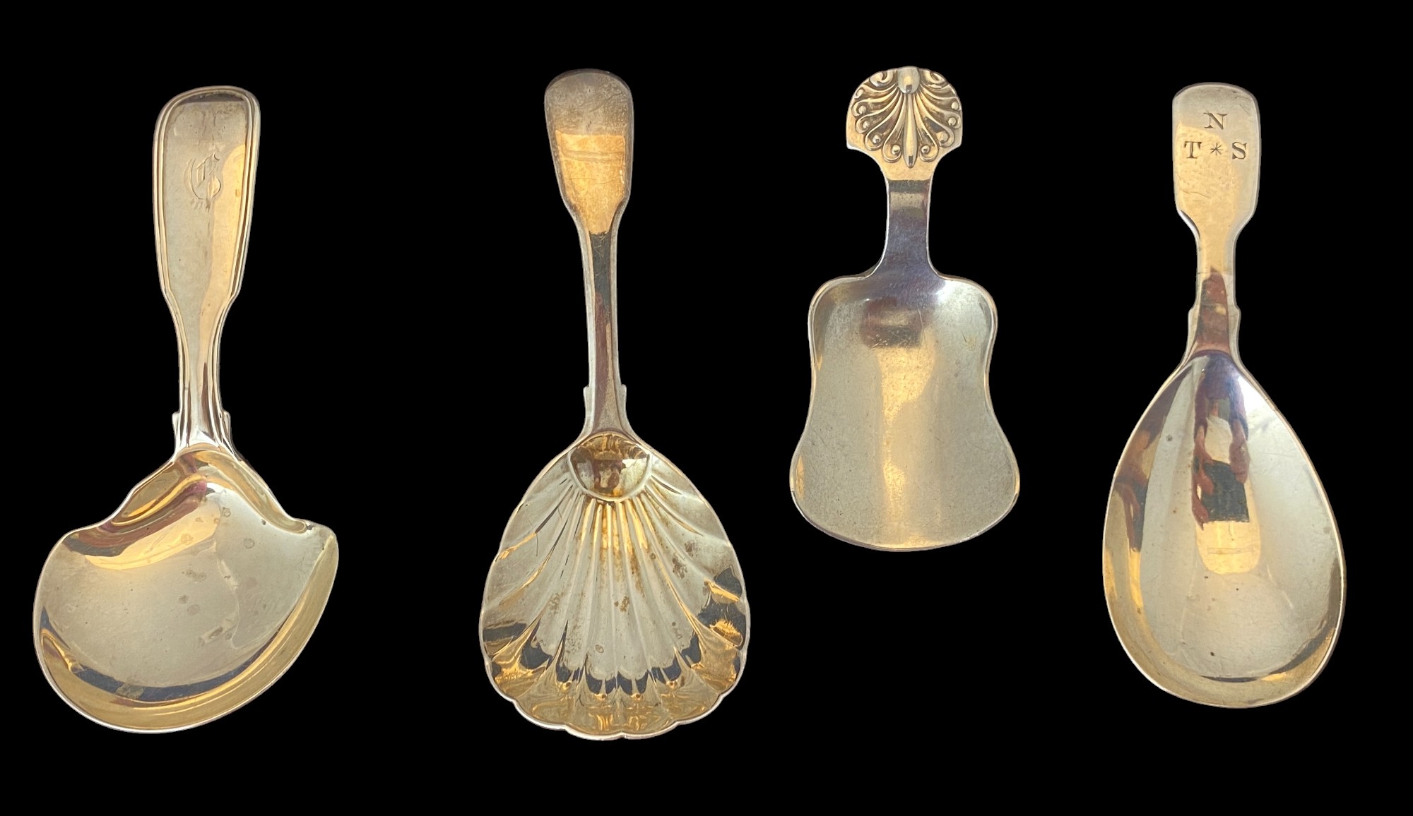 A group of four silver caddy spoons