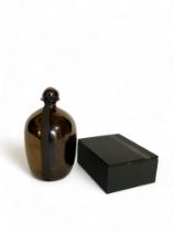 A Studio pottery lustre decanter and stopper and a studio pottery slab box