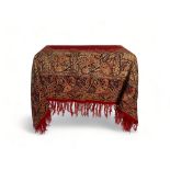 A 19th century red, brown and blue paisley cotton shawl together with another shawl