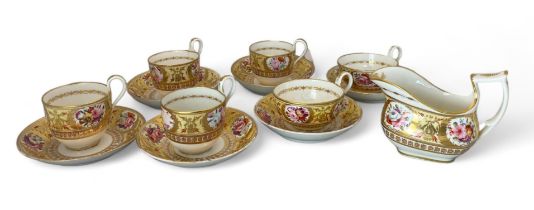 An early 19th century Coalport floral decorated part tea service