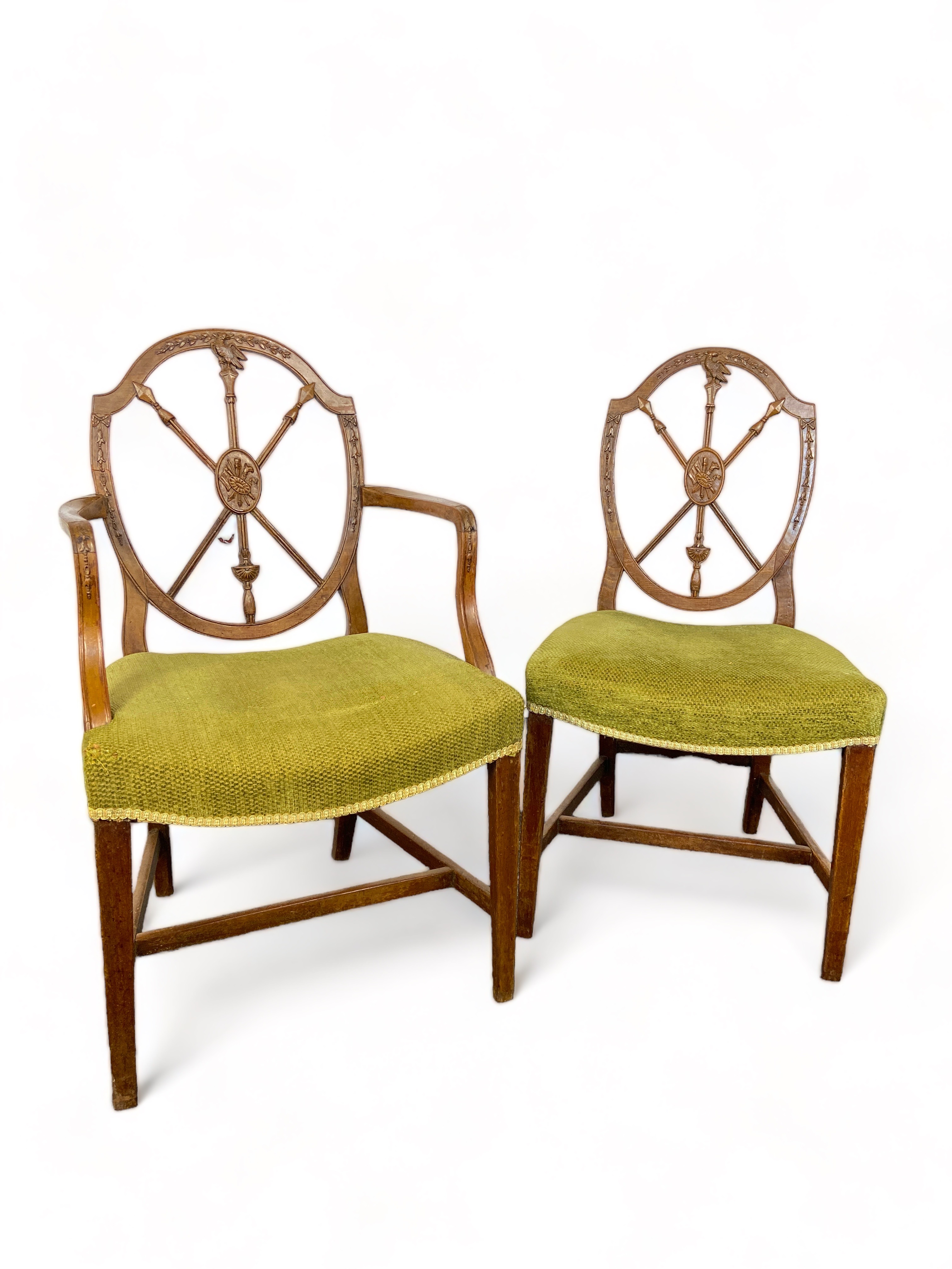 Cesinsky illustrated: A set of eight George III birch dining chairs including a pair of open armchai