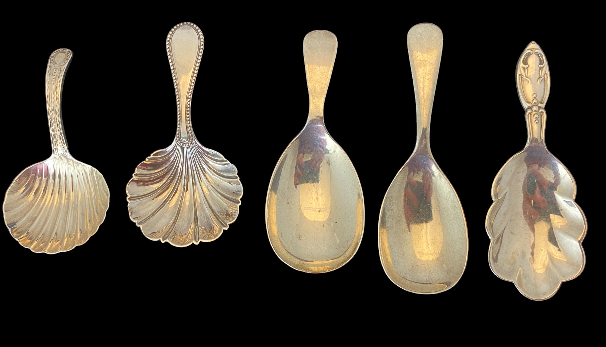 A group of five silver caddy spoons