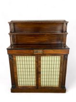 A Regency rosewood and gilt bronze mounted chiffonier side cabinet