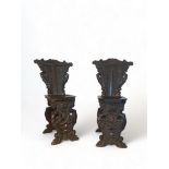 A pair of 19th century Italian Renaissance style carved walnut sgabello chairs