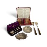 Two silver dishes, a cased set of silver child's cutlery, an early 20th century cased bone handled s