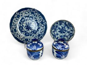 A small group of Asian blue and white floral and foliate decorated ceramics