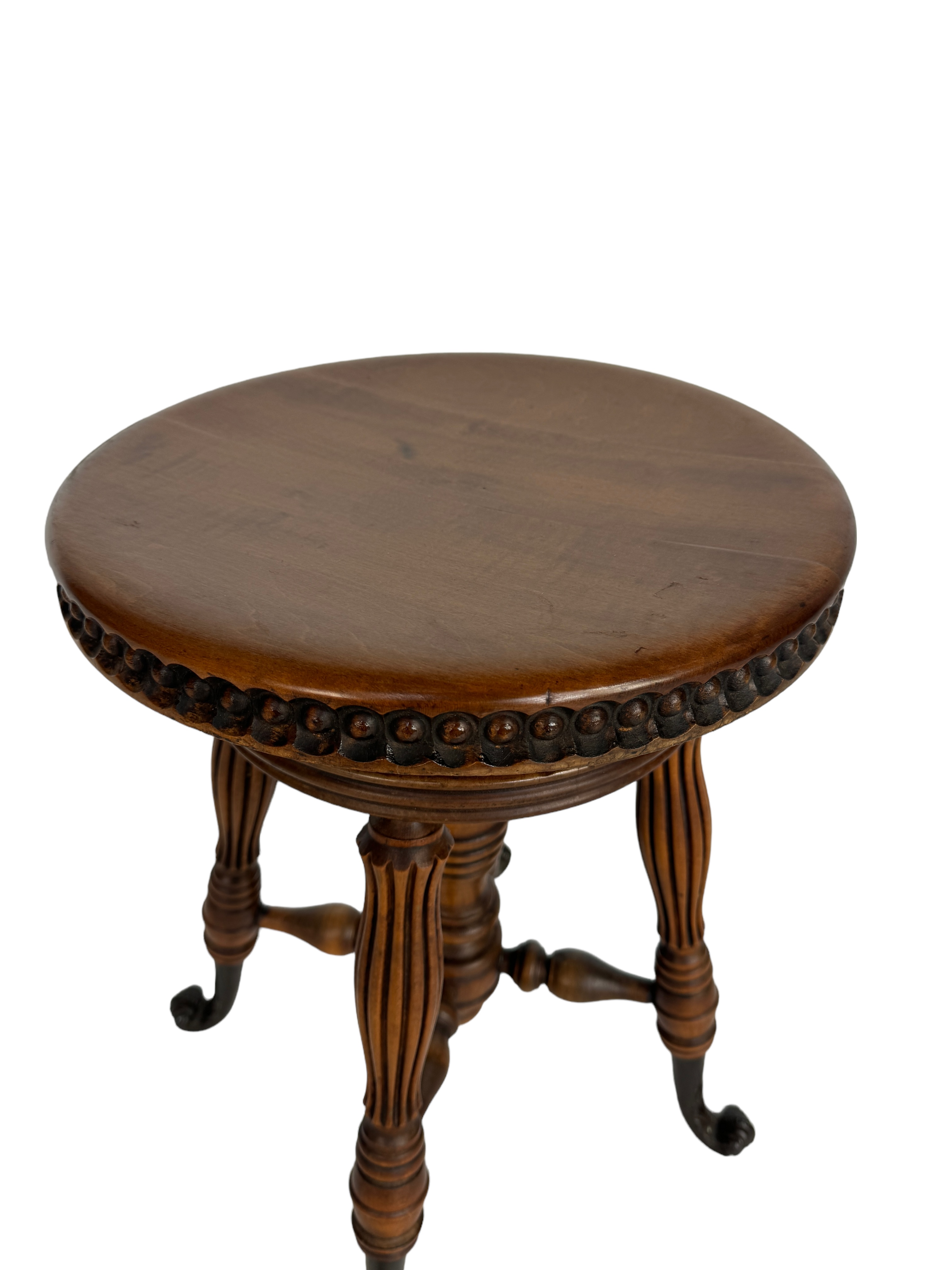 A late 19th century American beechwood circular revolving piano stool by Tonk of New York & Chicago - Image 4 of 5