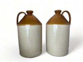 A pair of Victorian brown stoneware beer / cider flagons by Gibbs & Canning of Tamworth