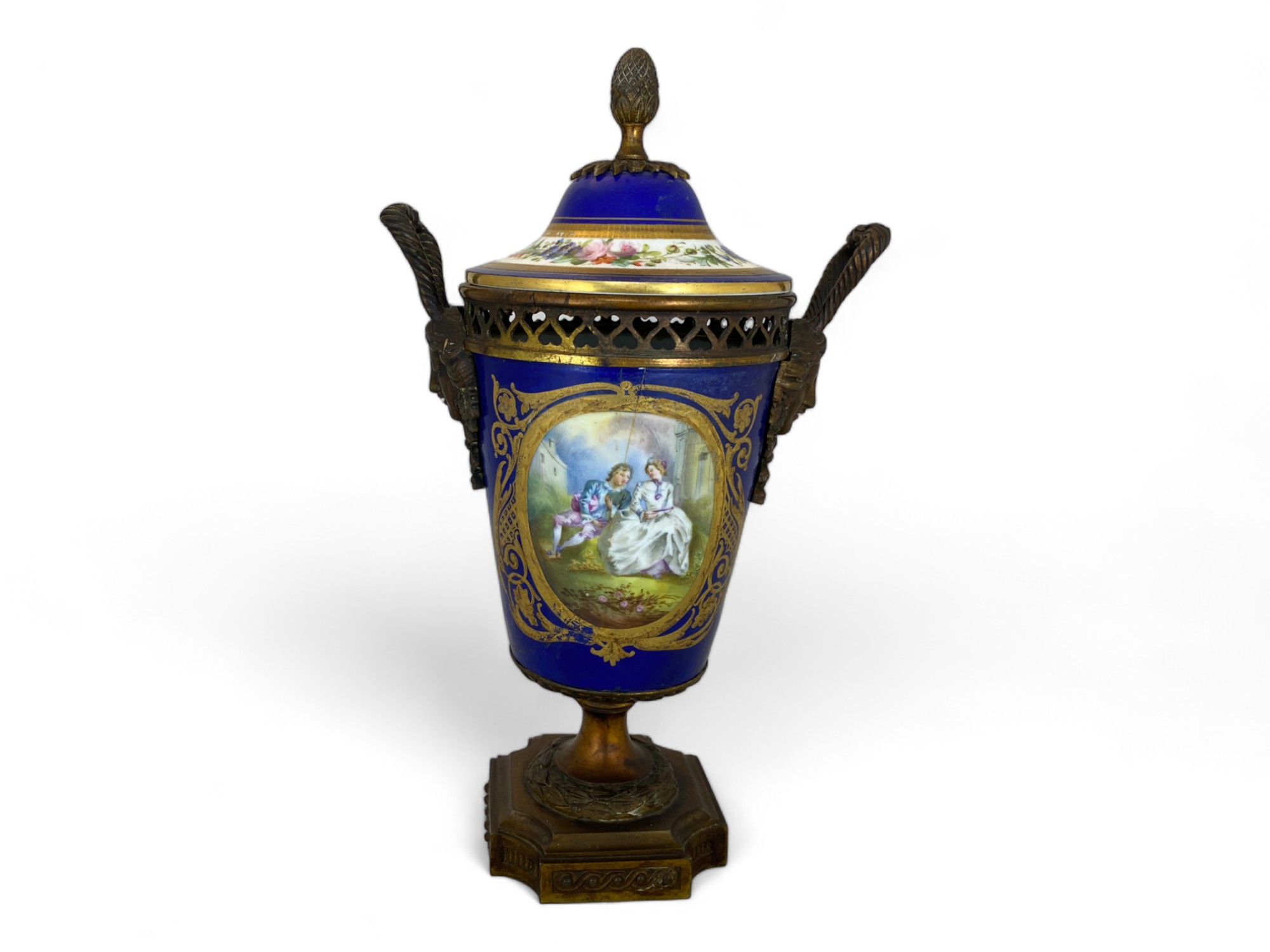 A 19th century Sèvres style porcelain and gilt bronze mounted beau bleu cup and cover