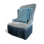 A Victorian style Colefax and Fowler blue cut velvet check upholstered fire side chair