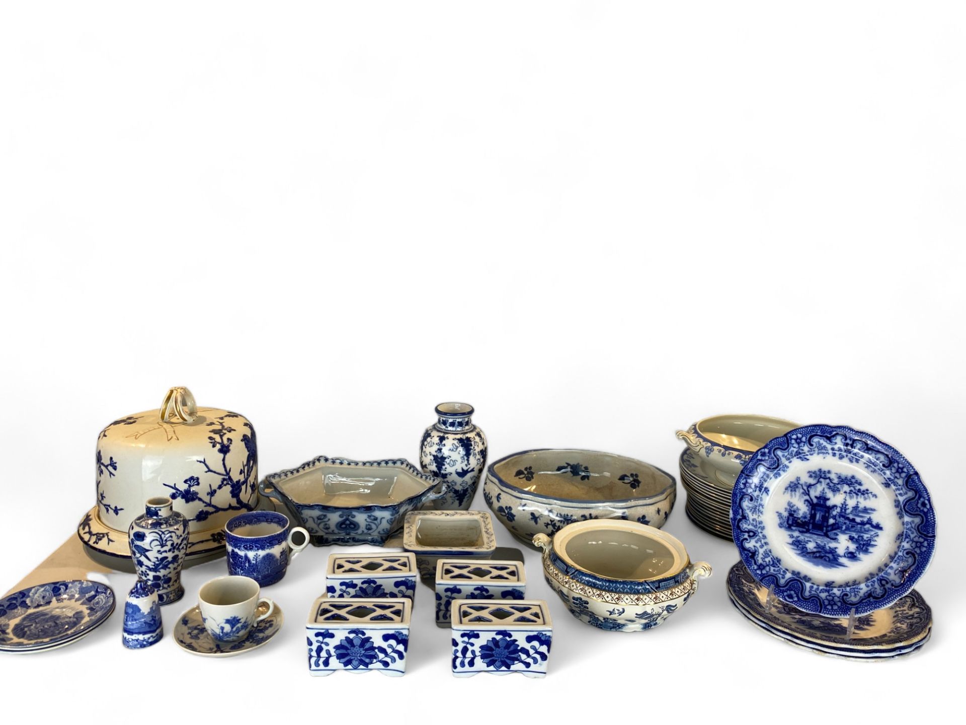 A collection of mostly English 19th century and later blue and white pottery and porcelain