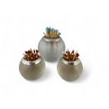 Three Edwardian ribbed globular glass and silver rimmed match strikes