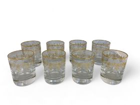 A set of eight Baccarat Recamier pattern glass and gilt foliate decorated tumblers