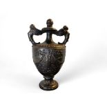 A large early 20th century terracotta classical twin handled urn with a metallic bronzed glaze
