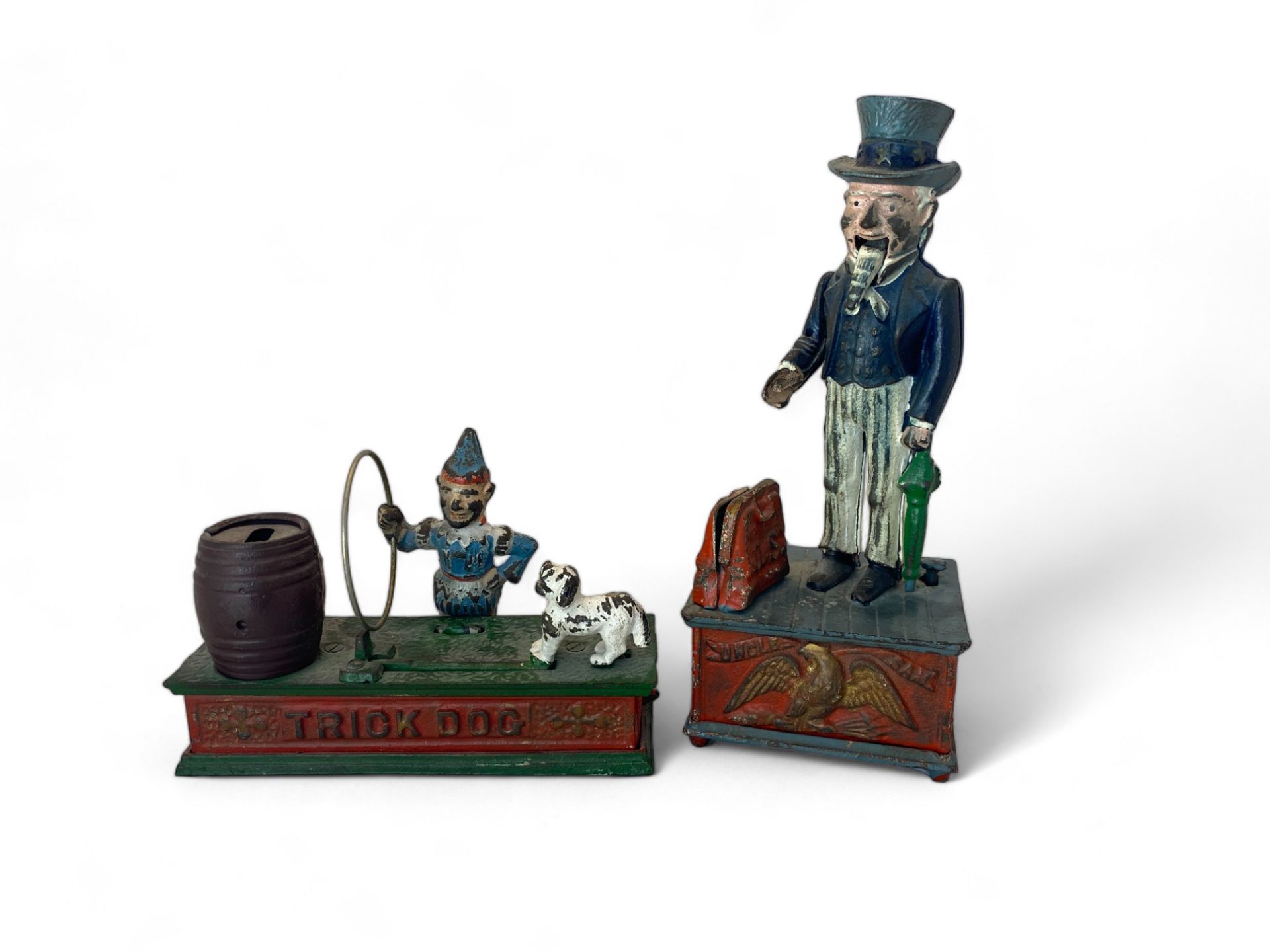 Two vintage cast iron painted novelty money boxes