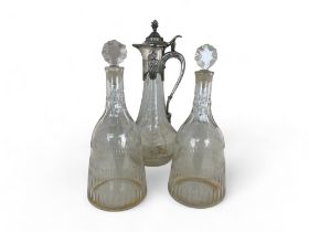 A pair of late George III cut glass taper decanters and a late 20th century claret jug