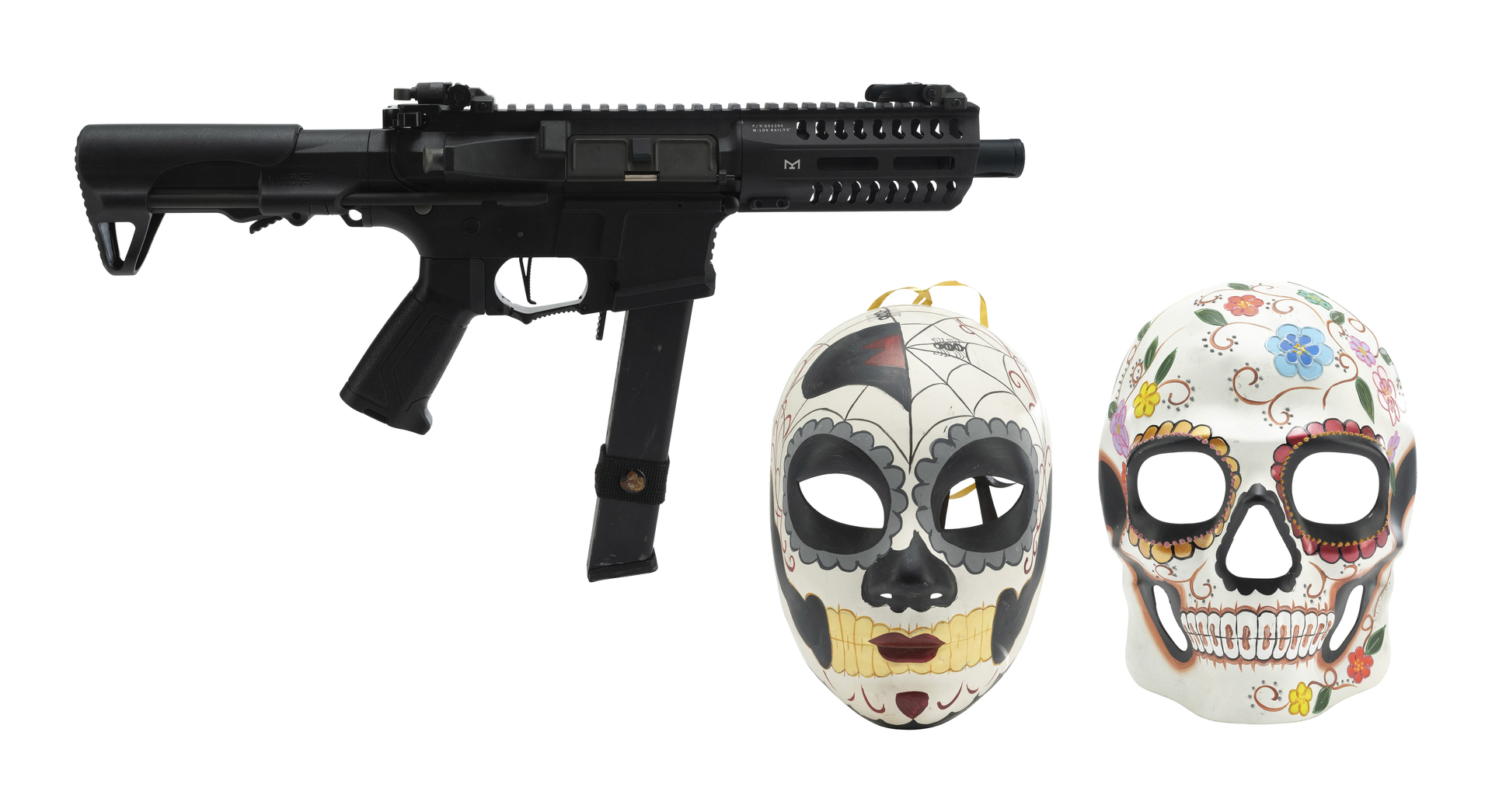 MACGYVER (T.V. SERIES, 2016 - 2021) - Rifle and Pair of Dia De Los Muertos Masks