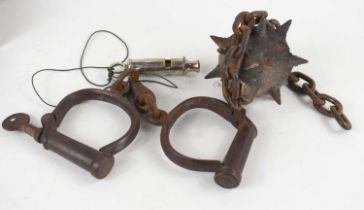 A pair of Hiatt WWI military handcuffs, stamped 'Hiatt and 'M&C 1917' and also stamped with broad