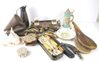 A group of collectables to include a Paraffin fuelled iron, treen carpet beaters, cold blast bee