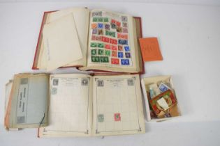 Two stamp albums containing GB and worldwide examples, dating from the late 19th century onwards.