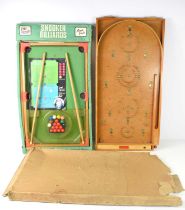 A vintage Chad Valley Bagatelle board with its original box together with a Steve Davies "Pot Black"