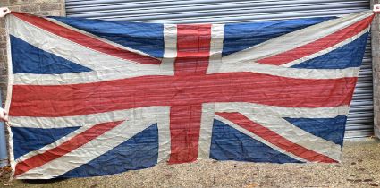 A large Naval Union Jack flag, early 20th century, double stitched, 129cm by 282cm.