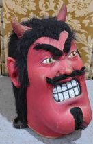 A large carnival mask in the form of the devil or possibly Noh, 55cm high