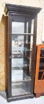 A mahogany glass display cabinet, with mirrored back, and glass shelves and original key, 186 by