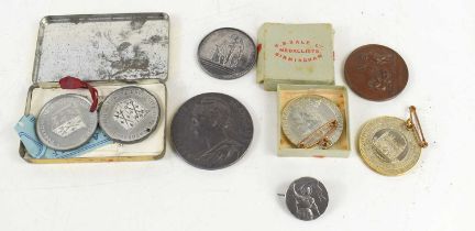 A group of medallions to include Ministère du Commerce et de L'industrie dated 1897, Edward VII