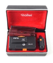 A vintage Rollei camera, flash and pouch in the original case.