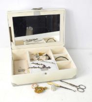 A jewellery box containing jewellery and collectables, including silver and amethyst necklace,
