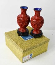 A pair of 20th century Chinese Cinnabar vases, in the original presentation box.