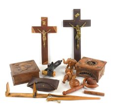 A group of treen to include trinket boxes, ornaments, glove stretcher, crucifix and other items.