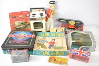 A group of vintage toys and games to include Monopoly 1935 edition, Airfix Cromwell tank starter