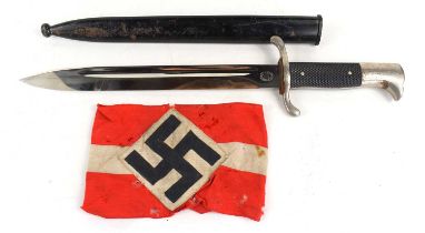 A WWII German armband together with a Carl Eickhorn Solingen parade dagger and scabbard.